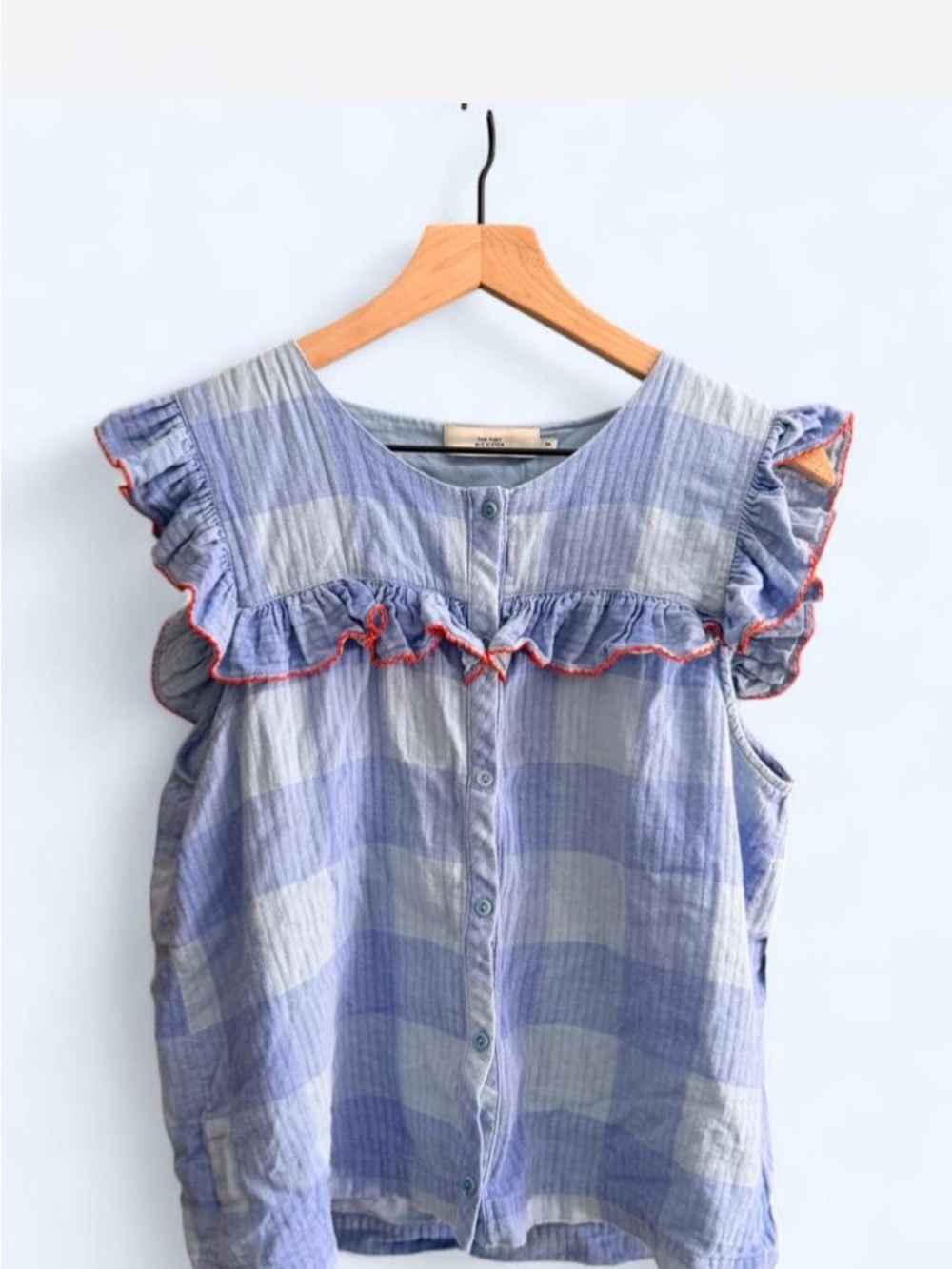 The tiny big sister Light Blue Ruffle Button-Front top with Contrast Trim